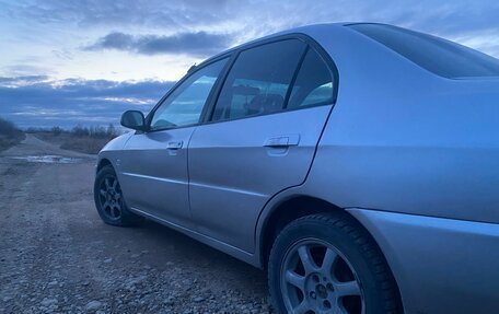 Mitsubishi Mirage VI рестайлинг, 1998 год, 130 000 рублей, 5 фотография