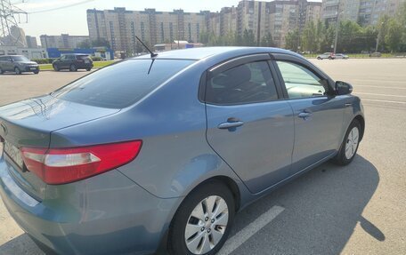 KIA Rio III рестайлинг, 2013 год, 14 фотография