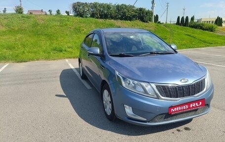 KIA Rio III рестайлинг, 2013 год, 15 фотография