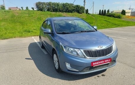 KIA Rio III рестайлинг, 2013 год, 16 фотография
