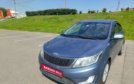 KIA Rio III рестайлинг, 2013 год, 17 фотография