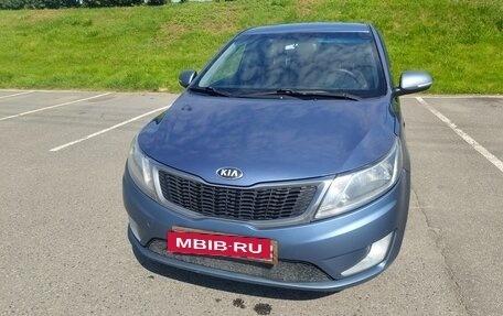 KIA Rio III рестайлинг, 2013 год, 20 фотография