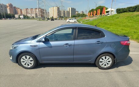 KIA Rio III рестайлинг, 2013 год, 22 фотография