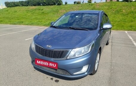 KIA Rio III рестайлинг, 2013 год, 19 фотография