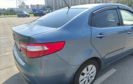 KIA Rio III рестайлинг, 2013 год, 24 фотография