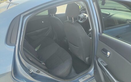 KIA Rio III рестайлинг, 2013 год, 27 фотография