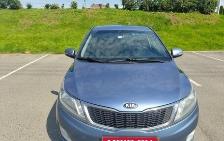 KIA Rio III рестайлинг, 2013 год, 28 фотография