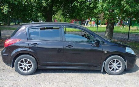 Nissan Tiida, 2010 год, 700 000 рублей, 5 фотография