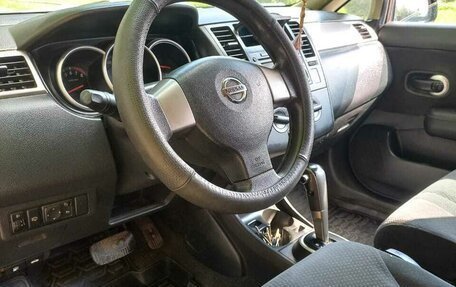 Nissan Tiida, 2010 год, 700 000 рублей, 8 фотография