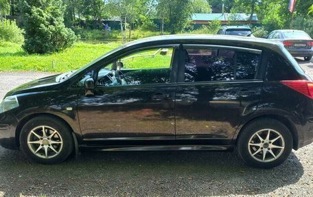 Nissan Tiida, 2010 год, 700 000 рублей, 9 фотография