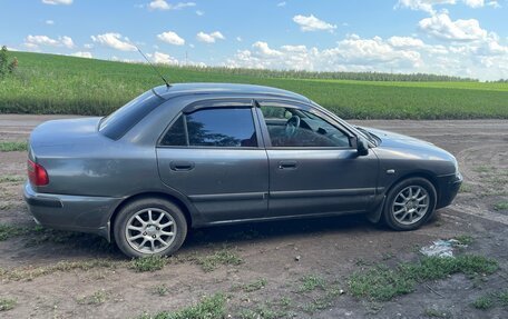 Mitsubishi Carisma I, 2002 год, 250 000 рублей, 2 фотография