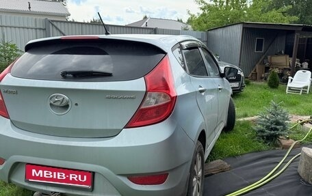Hyundai Solaris II рестайлинг, 2011 год, 750 000 рублей, 3 фотография
