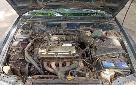 Mitsubishi Carisma I, 1998 год, 150 000 рублей, 16 фотография