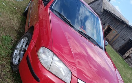Mazda 323, 2000 год, 300 000 рублей, 7 фотография