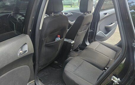 Opel Astra J, 2011 год, 750 000 рублей, 8 фотография