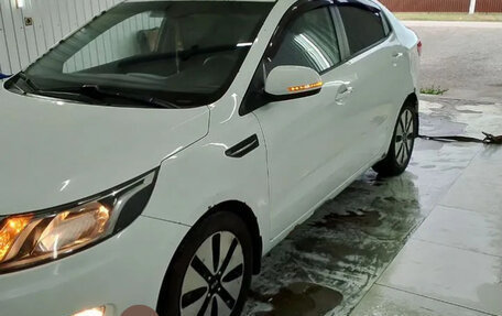 KIA Rio III рестайлинг, 2011 год, 730 000 рублей, 11 фотография