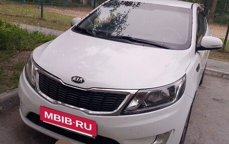 KIA Rio III рестайлинг, 2011 год, 730 000 рублей, 21 фотография