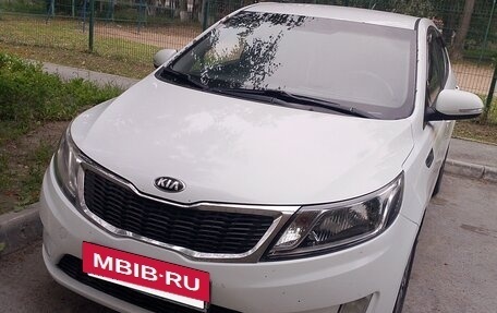 KIA Rio III рестайлинг, 2011 год, 730 000 рублей, 29 фотография