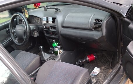 Mazda 323, 1998 год, 100 000 рублей, 9 фотография