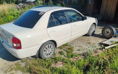 Mazda Familia, 1999 год, 215 000 рублей, 2 фотография