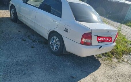 Mazda Familia, 1999 год, 215 000 рублей, 7 фотография