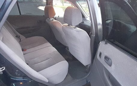 Mazda Familia, 1999 год, 310 000 рублей, 2 фотография