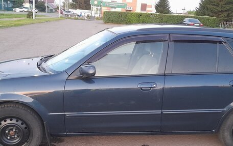 Mazda Familia, 1999 год, 310 000 рублей, 8 фотография