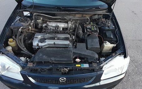 Mazda Familia, 1999 год, 310 000 рублей, 10 фотография