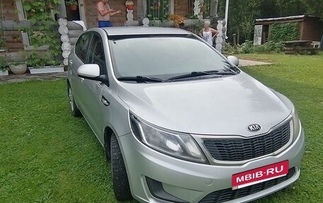 KIA Rio III рестайлинг, 2013 год, 700 000 рублей, 10 фотография