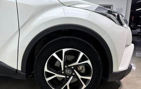 Toyota C-HR I рестайлинг, 2021 год, 1 880 000 рублей, 14 фотография