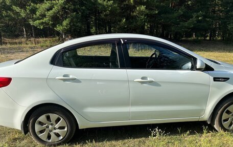 KIA Rio III рестайлинг, 2013 год, 700 000 рублей, 2 фотография