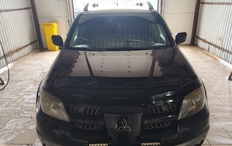 Mitsubishi Outlander III рестайлинг 3, 2005 год, 600 000 рублей, 10 фотография
