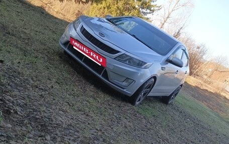 KIA Rio III рестайлинг, 2013 год, 610 000 рублей, 18 фотография