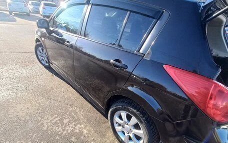 Nissan Tiida, 2010 год, 700 000 рублей, 9 фотография