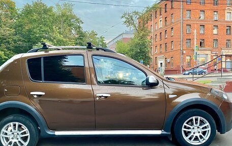 Renault Sandero I, 2013 год, 750 000 рублей, 2 фотография