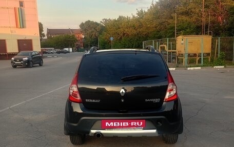 Renault Sandero I, 2013 год, 750 000 рублей, 2 фотография
