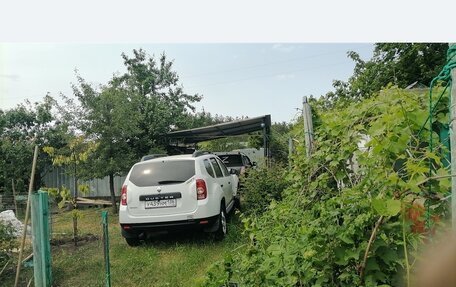 Renault Duster I рестайлинг, 2012 год, 928 000 рублей, 2 фотография