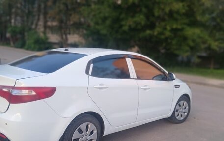KIA Rio III рестайлинг, 2012 год, 900 000 рублей, 10 фотография
