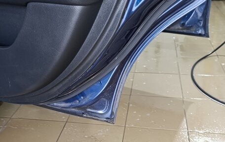 Nissan Tiida, 2010 год, 570 000 рублей, 8 фотография