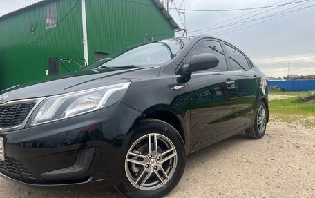 KIA Rio III рестайлинг, 2011 год, 750 000 рублей, 2 фотография