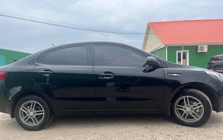 KIA Rio III рестайлинг, 2011 год, 750 000 рублей, 11 фотография
