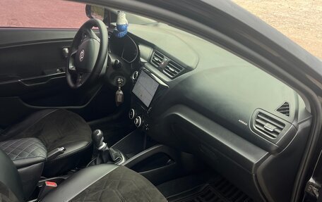 KIA Rio III рестайлинг, 2011 год, 750 000 рублей, 19 фотография