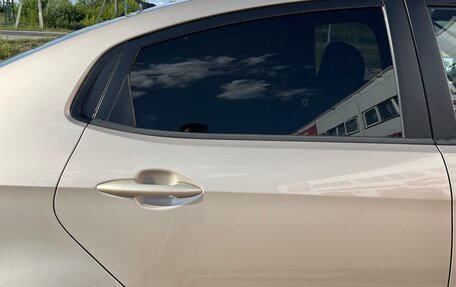 KIA Rio III рестайлинг, 2011 год, 750 000 рублей, 16 фотография
