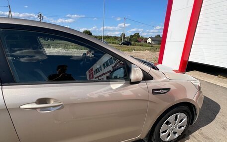 KIA Rio III рестайлинг, 2011 год, 750 000 рублей, 19 фотография