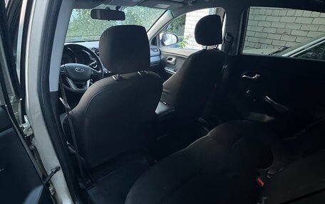 KIA Rio III рестайлинг, 2011 год, 750 000 рублей, 34 фотография