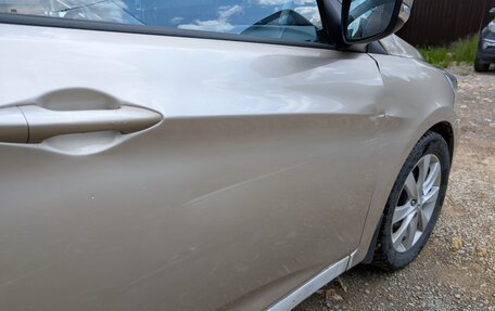 Hyundai Solaris II рестайлинг, 2011 год, 650 000 рублей, 20 фотография