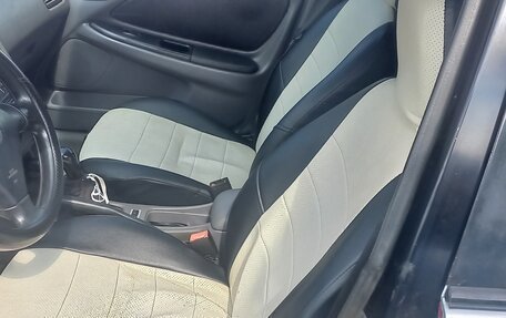 Toyota Avensis III рестайлинг, 1999 год, 7 фотография