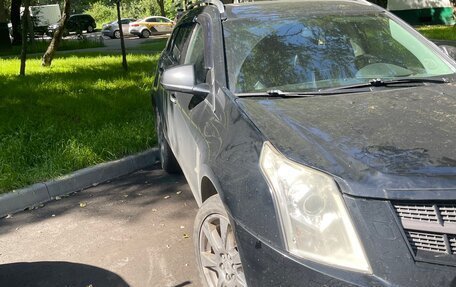 Cadillac SRX II рестайлинг, 2011 год, 750 000 рублей, 2 фотография