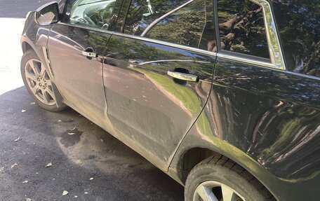 Cadillac SRX II рестайлинг, 2011 год, 750 000 рублей, 7 фотография