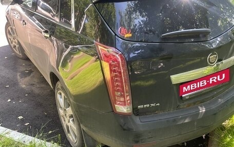 Cadillac SRX II рестайлинг, 2011 год, 750 000 рублей, 8 фотография